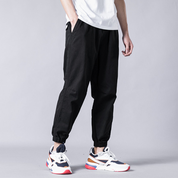 Vabaaja meeste pükste lai taskutega mudel