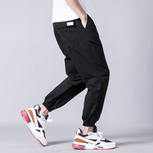 Vabaaja meeste pükste lai taskutega mudel