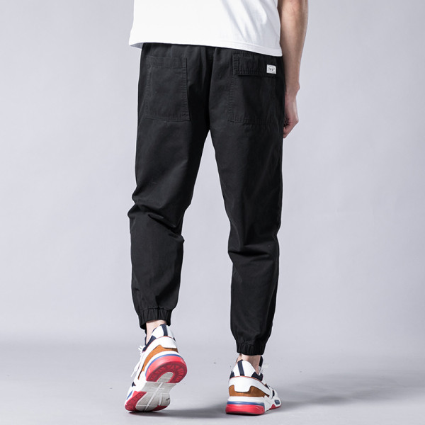 Vabaaja meeste pükste lai taskutega mudel