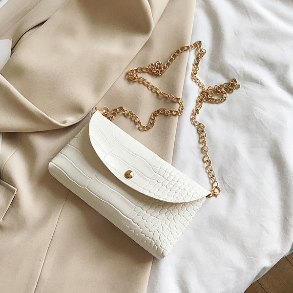 Ikdienas sieviešu soma ar reljefu pārvalku un garu rokturi