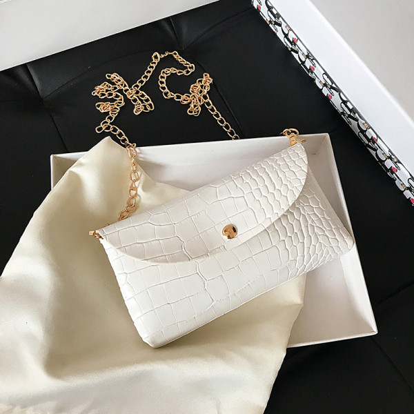 Ikdienas sieviešu soma ar reljefu pārvalku un garu rokturi