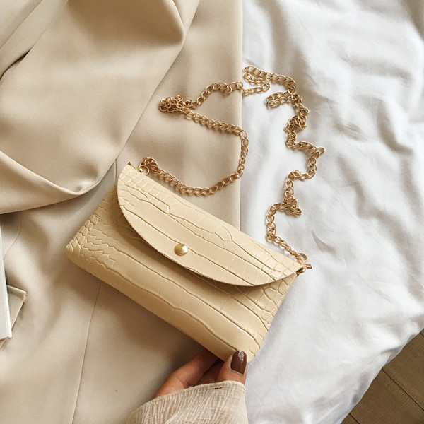 Ikdienas sieviešu soma ar reljefu pārvalku un garu rokturi