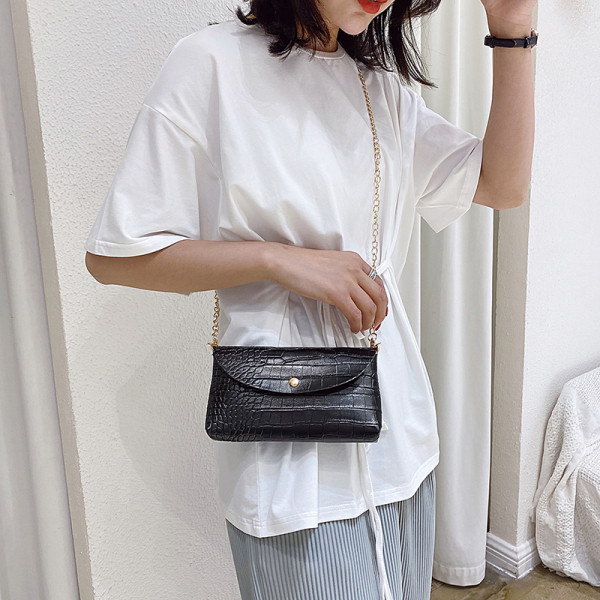 Ikdienas sieviešu soma ar reljefu pārvalku un garu rokturi