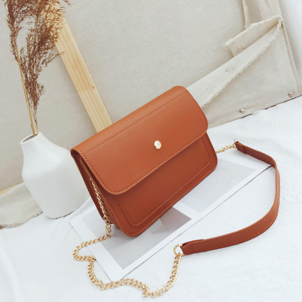 Moderna sieviešu soma no eko ādas ar garu roktura tipa ķēdīti