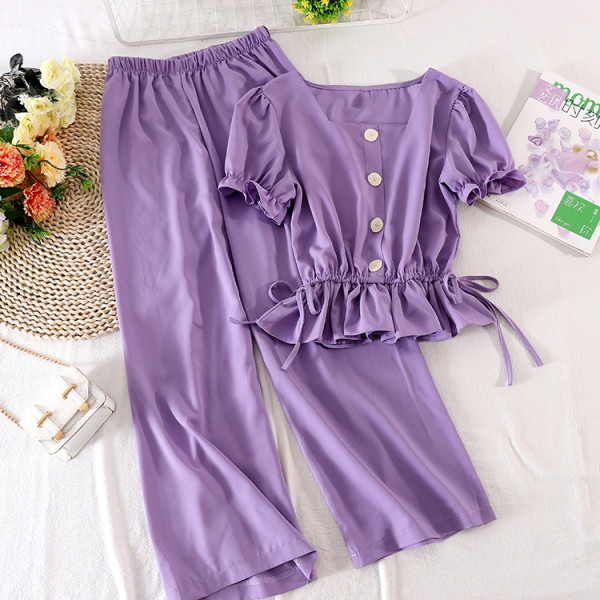 Moodne kaheosaline naiste komplekt - lühikeste varrukatega pluus ja laiad püksid