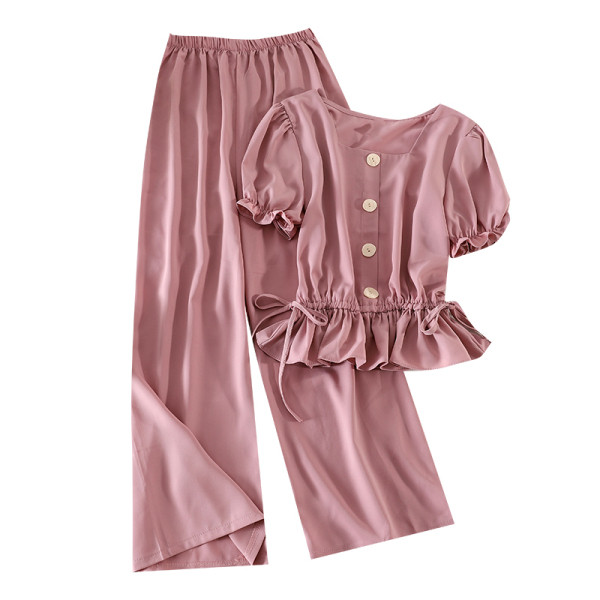 Moodne kaheosaline naiste komplekt - lühikeste varrukatega pluus ja laiad püksid