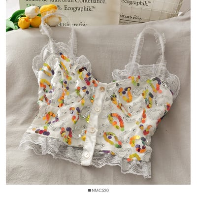 Mūsdienīgs sieviešu tops ar fliteriem un mežģīnēm