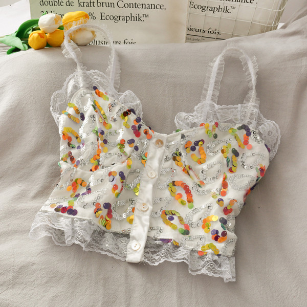 Mūsdienīgs sieviešu tops ar fliteriem un mežģīnēm