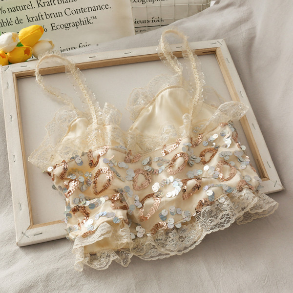 Mūsdienīgs sieviešu tops ar fliteriem un mežģīnēm