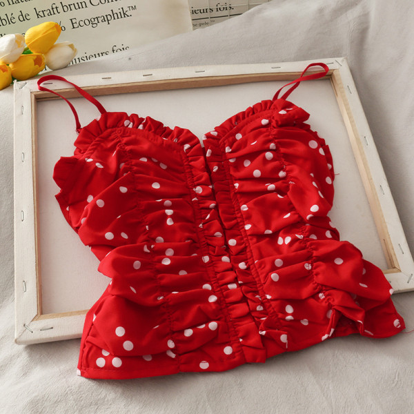 Naiste täpiline topp õhukeste rihmade ja spitsikaelusega