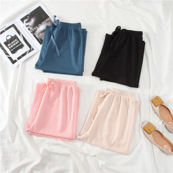 Női széles modellnadrág magas derékkal és megkötővel