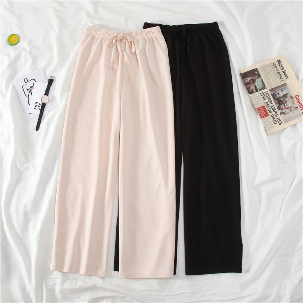 Női széles modellnadrág magas derékkal és megkötővel