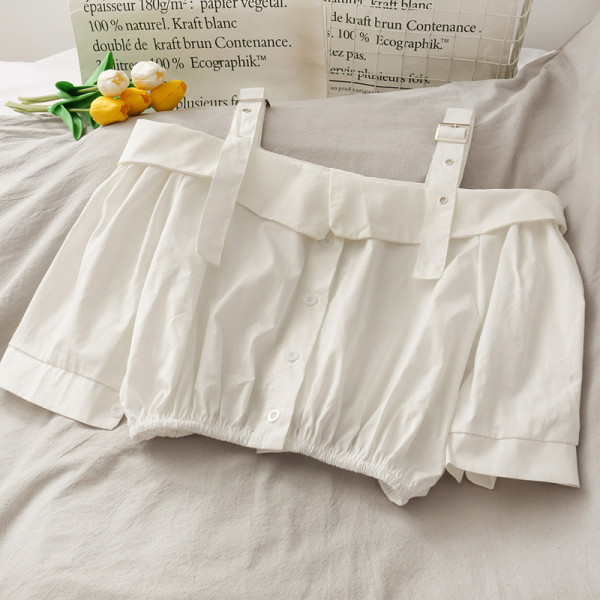 Modern női blúz csatokkal és gombokkal