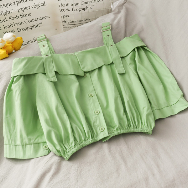 Modern női blúz csatokkal és gombokkal