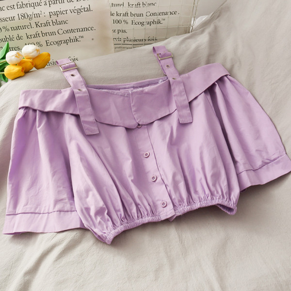 Modern női blúz csatokkal és gombokkal