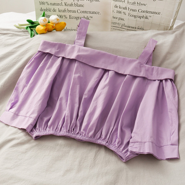 Modern női blúz csatokkal és gombokkal