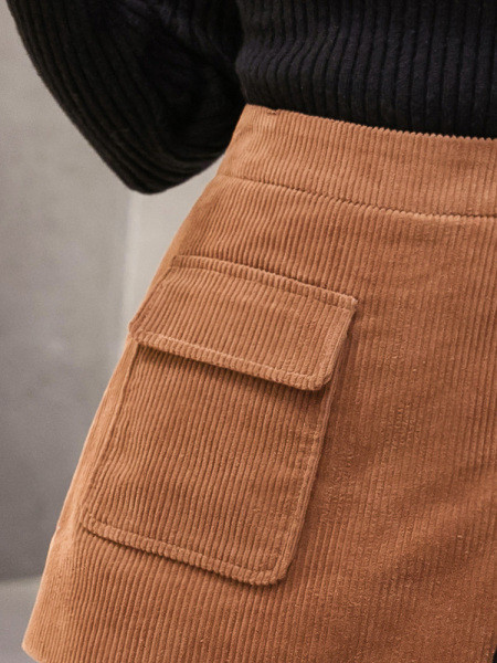 Sieviešu svārki-bikses asimetrisks modelis ar pogām