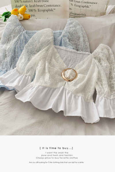 Sieviešu blūze ar špica kakla izgriezumu un metāla elementu