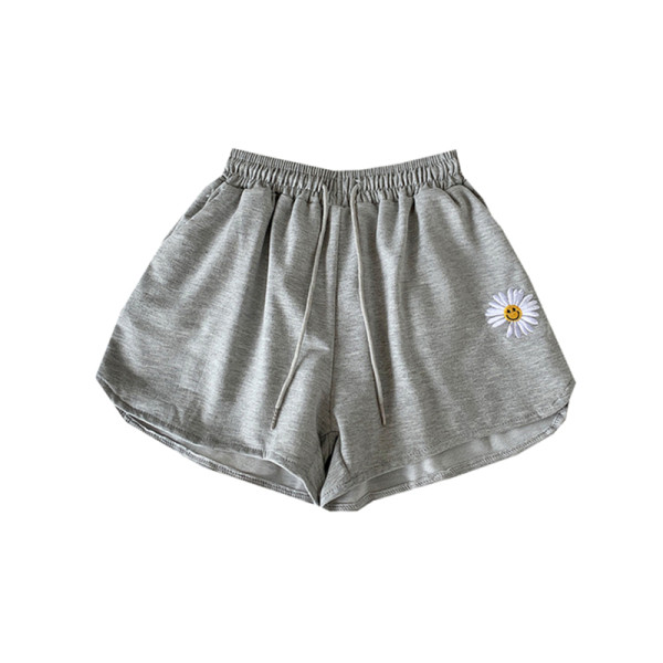 Tikitud ja elastse vöökohaga naiste lühikesed püksid