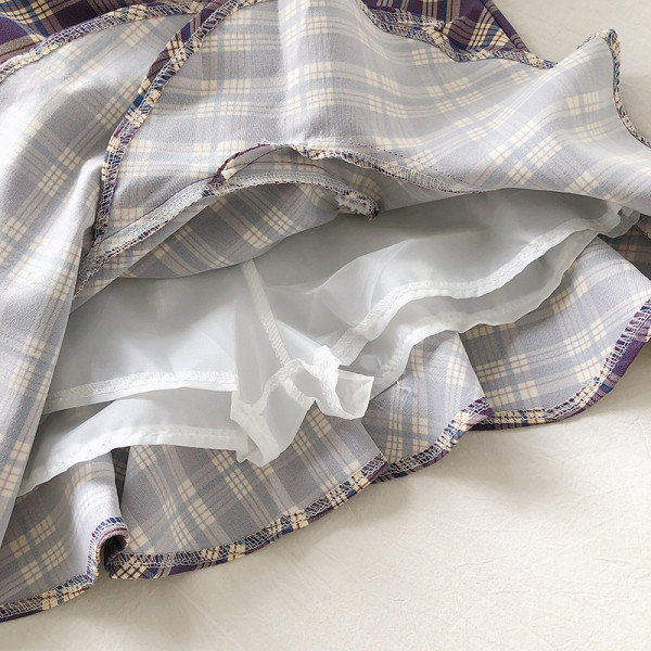 Kõrge vöökoha ja A-joonega ruuduline naiste lühike seelik