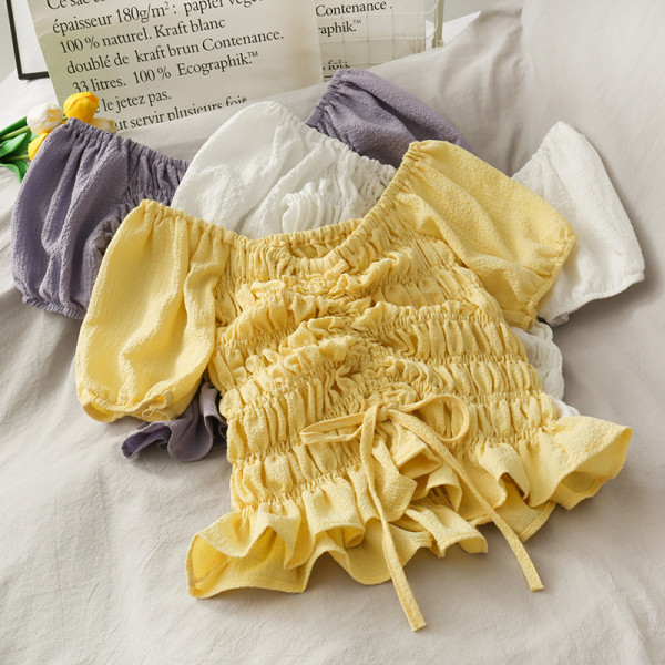 Bluză de damă cu legături și mâneci bufante