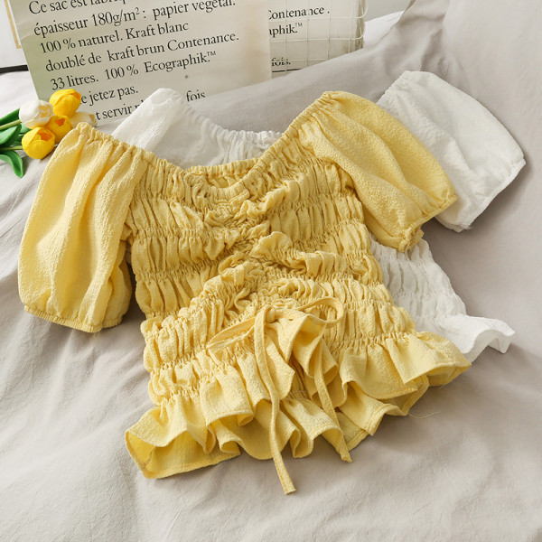 Bluză de damă cu legături și mâneci bufante