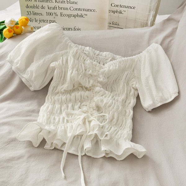 Bluză de damă cu legături și mâneci bufante