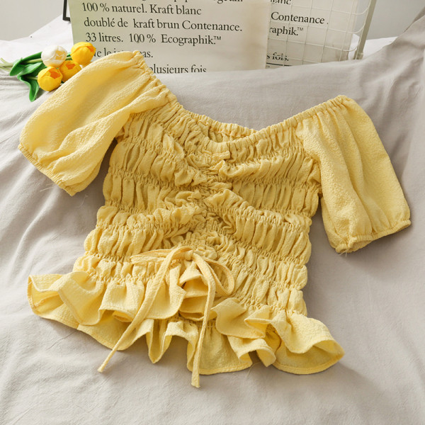 Bluză de damă cu legături și mâneci bufante