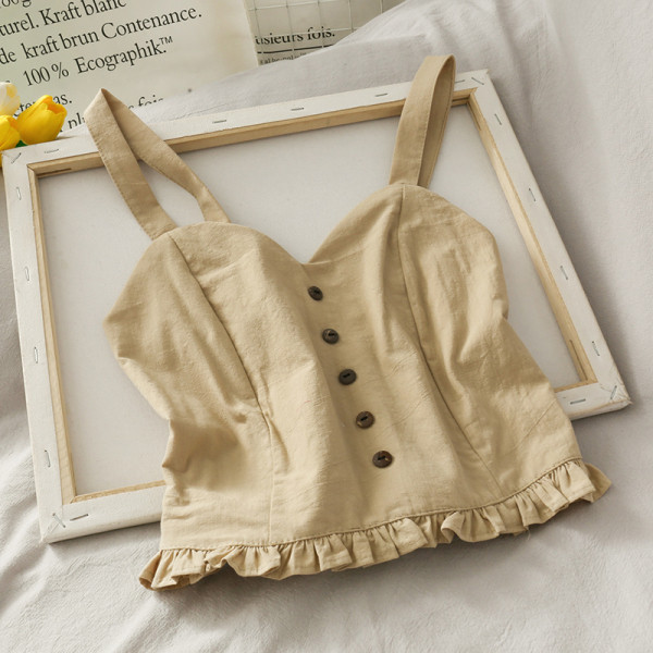 Női lezser felső gombokkal és széles pántokkal