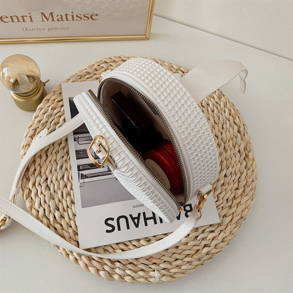 Kaasaegne naiste ümarkott pika sanga ja metallelemendiga