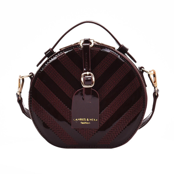 Geanta de dama actuala rotunda din piele lacuita