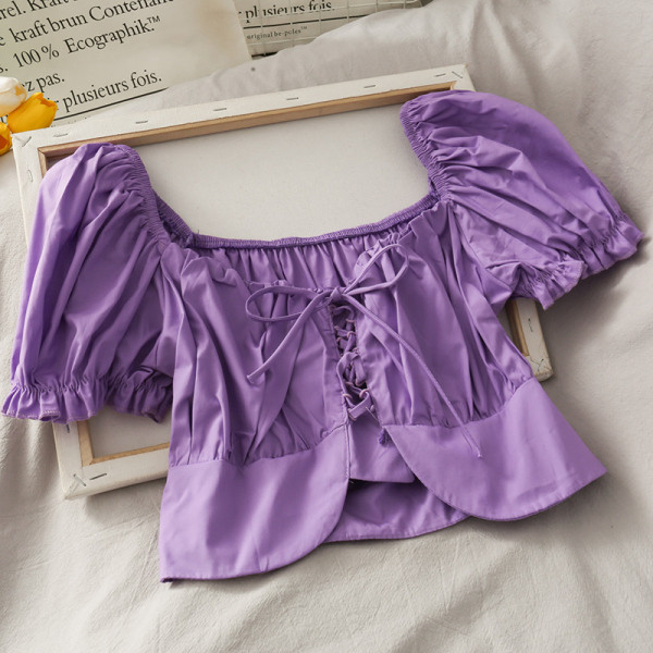 Női blúz leeső ujjakkal és nyakkendőkkel