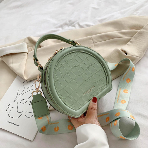 Geanta de dama de ultima generatie in forma rotunda si maner lung