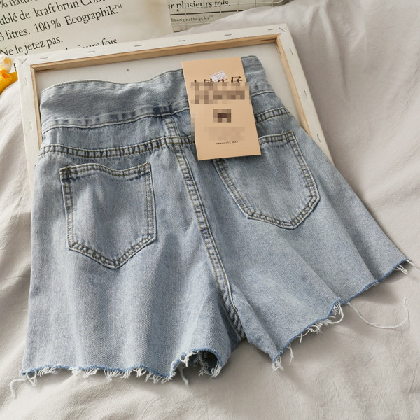 Rebenenud motiivide ja kõrge vöökohaga vabaaja naiste lühikesed teksad