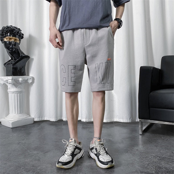 Férfi rövidnadrág felirattal és zsebekkel