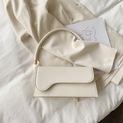 Moderna sieviešu plecu soma ar īsu rokturi