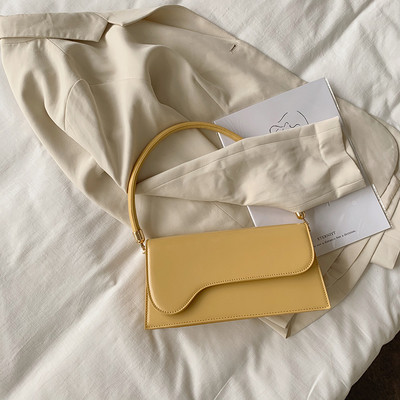 Moderna sieviešu plecu soma ar īsu rokturi