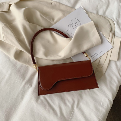 Moderna sieviešu plecu soma ar īsu rokturi