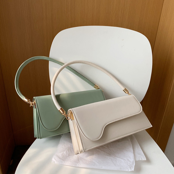 Moderna sieviešu plecu soma ar īsu rokturi