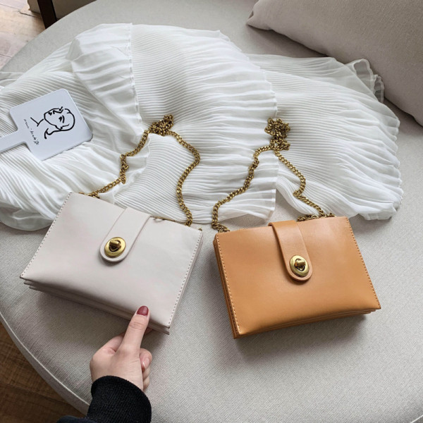 Geanta de dama mini moderna cu maner metalic