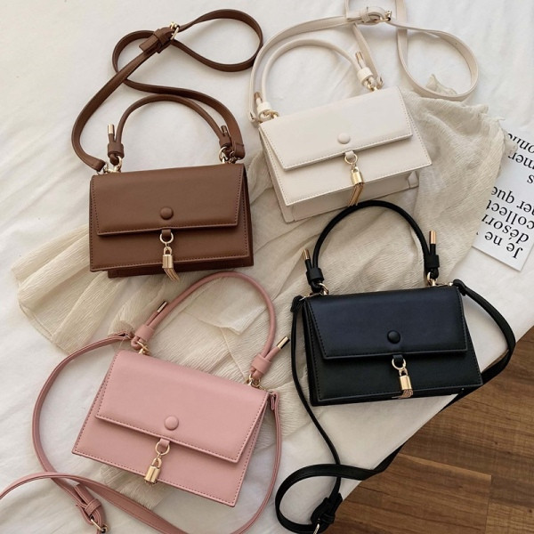 Geanta de dama de ultima generatie din piele ecologica cu element metalic