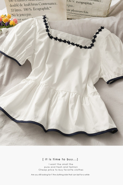 Kandilise dekoltee ja tikandiga naiste väljalõigatud pluus