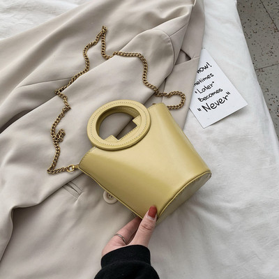 Geanta de dama de ultima generatie cu maner rotund si maner metalic