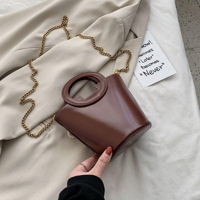 Geanta de dama de ultima generatie cu maner rotund si maner metalic