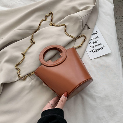 Geanta de dama de ultima generatie cu maner rotund si maner metalic