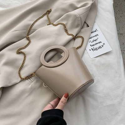 Geanta de dama de ultima generatie cu maner rotund si maner metalic