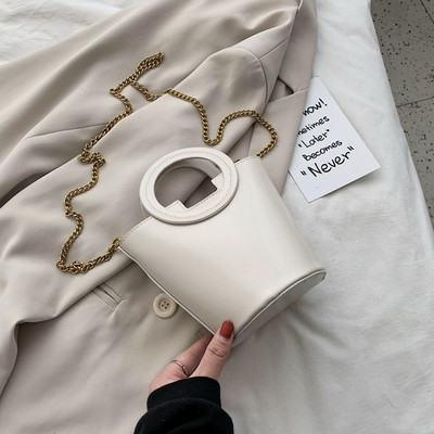 Geanta de dama de ultima generatie cu maner rotund si maner metalic