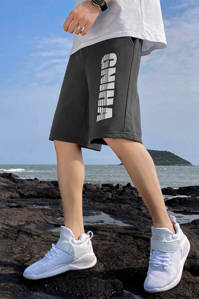 Alkalmi férfi nadrág felirattal és nyakkendővel