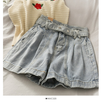 Naiste retrohõngulised kõrge vöökohaga lühikesed teksad