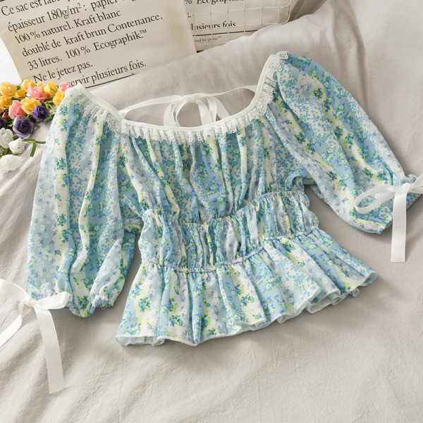 Paadikaelusega ja lipsudega naiste pluus